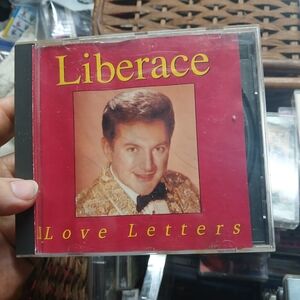 (CD) titled "Love Letters" by the artist Liberace.